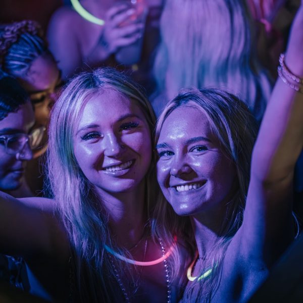 Two girls glow necklaces, PCB Spring Break 2026