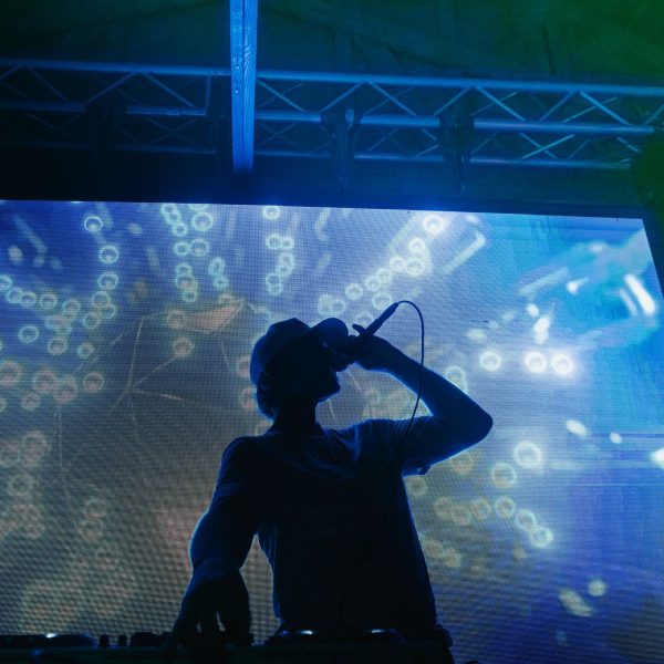 DJ silhouette blue screen, PCB Spring Break 2026