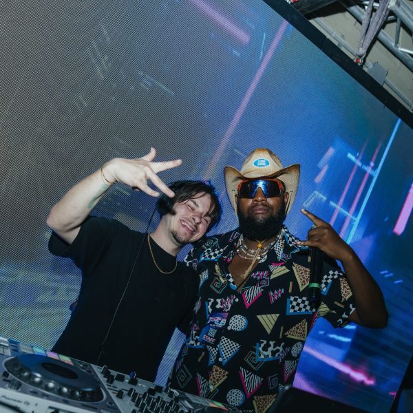 Two DJs posing, PCB Spring Break 2026