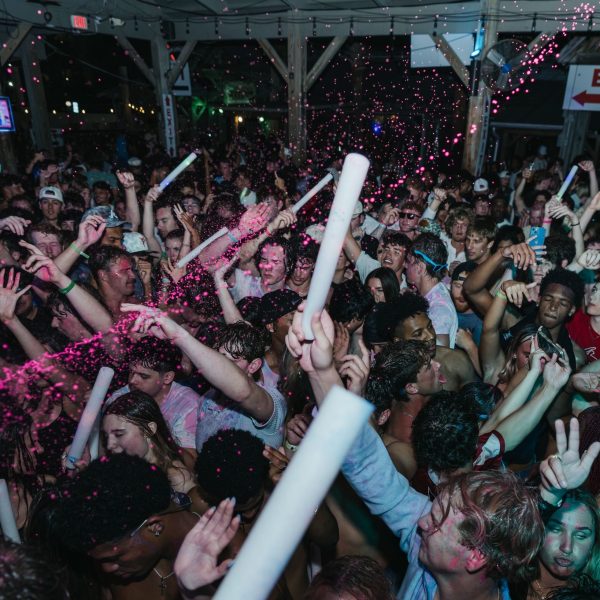 Glow sticks energetic crowd, PCB Spring Break 2026