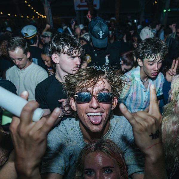 Guy with glow stick, PCB Spring Break 2026
