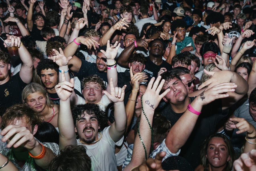 Crowd with hands up at the Hammerhead Fred’s concert, March 11, 2026