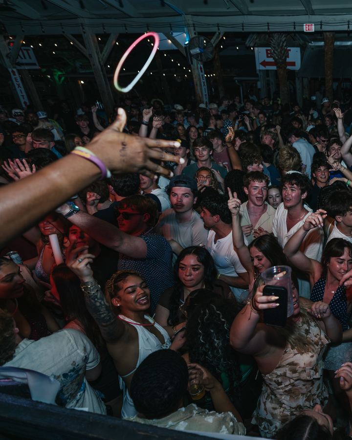 Hands up and a glow ring above the crowd