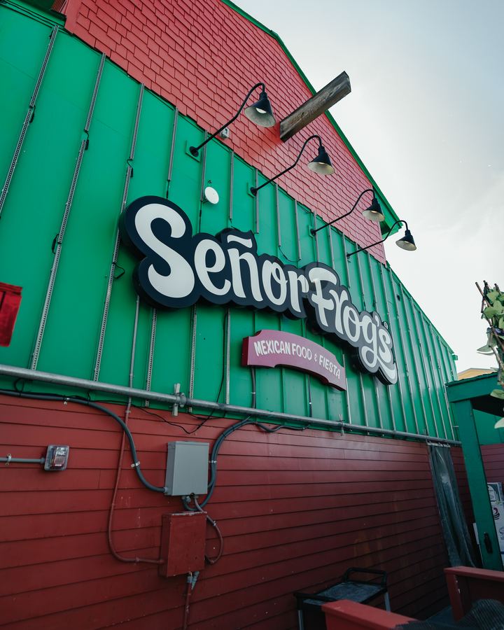 Señor Frog's sign on the red and green building