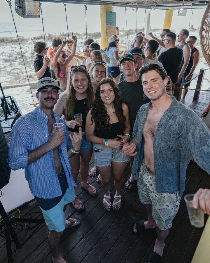 Friends smiling together at a day party