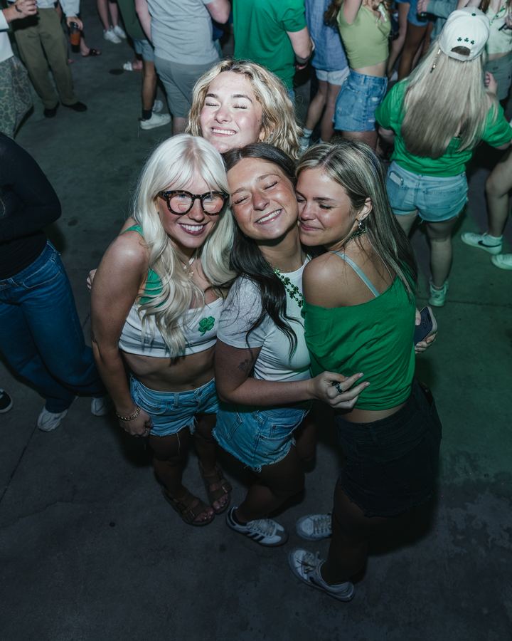 Friends dressed in green